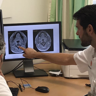 Researcher analyzing brain MRI scans for the Dutch ALD Cohort natural history study